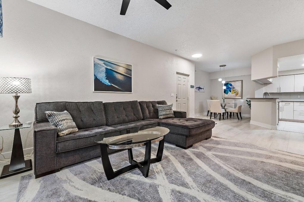 Photo of 3021 Alcazar Place #103, Palm Beach Gardens, FL 33410 (MLS # R11153950)