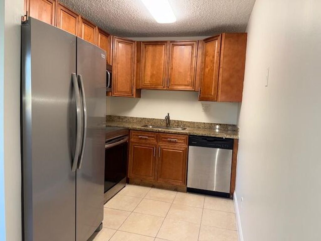 Photo of 407 Meadows Circle #407, Boynton Beach, FL 33436 (MLS # R11109271)