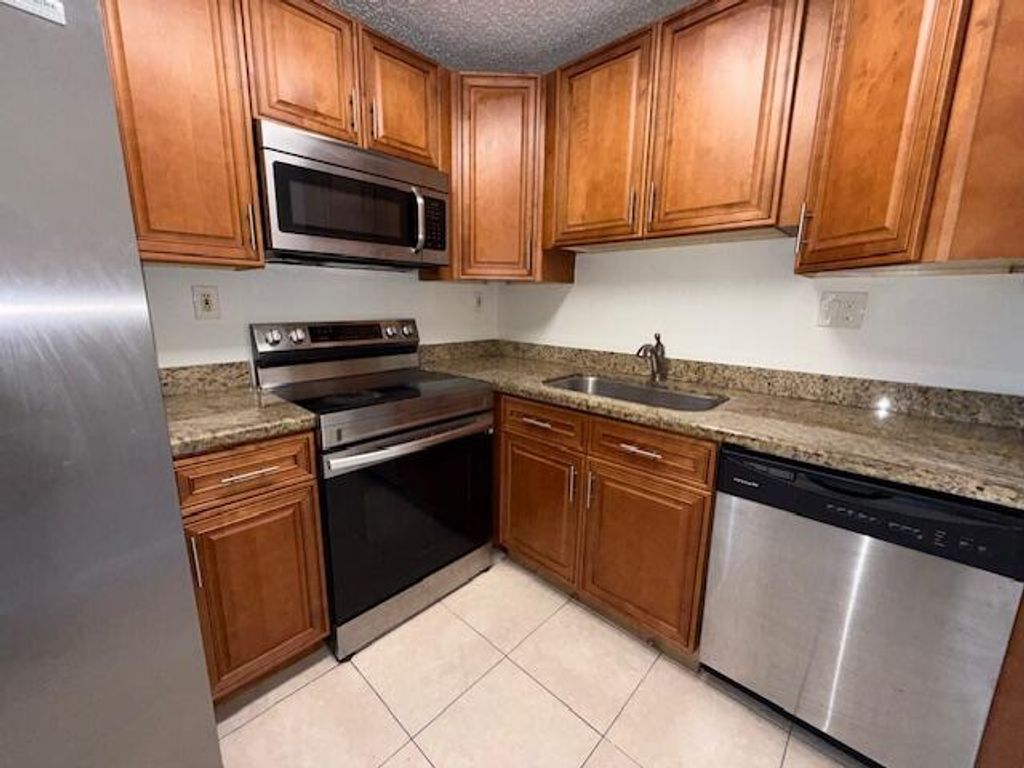 Photo of 407 Meadows Circle #407, Boynton Beach, FL 33436 (MLS # R11109271)