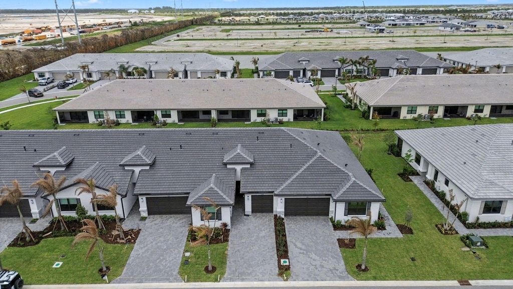 Photo of 13599 Starkissed Lane, Port Saint Lucie, FL 34987 (MLS # B26015735)