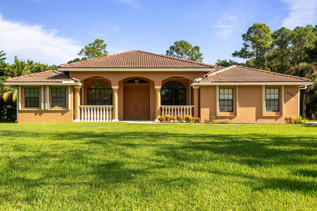 Photo of 15807 Citrus Grove Boulevard, Loxahatchee, FL 33470 (MLS # R11030894)