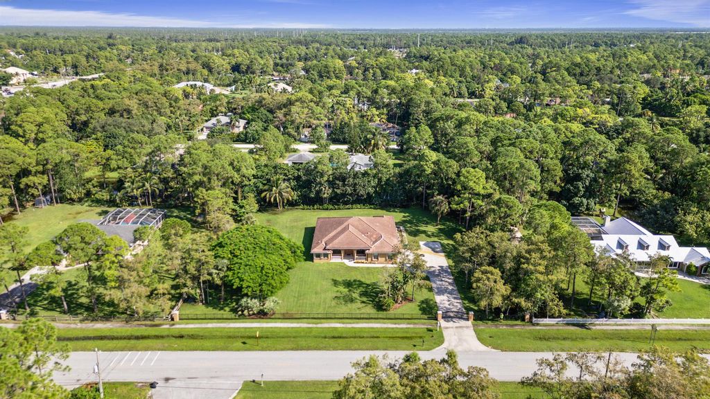 Photo of 15807 Citrus Grove Boulevard, Loxahatchee, FL 33470 (MLS # R11030894)