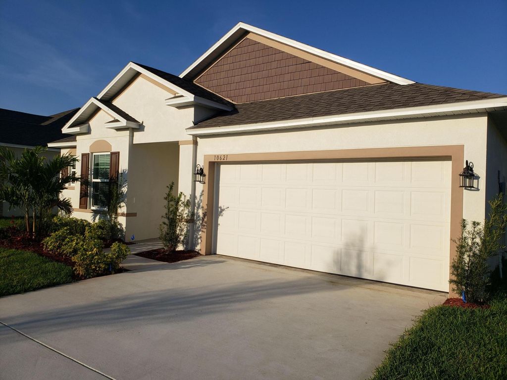 Photo of 10621 SW Vasari Way, Port Saint Lucie, FL 34987 (MLS # B26022467)