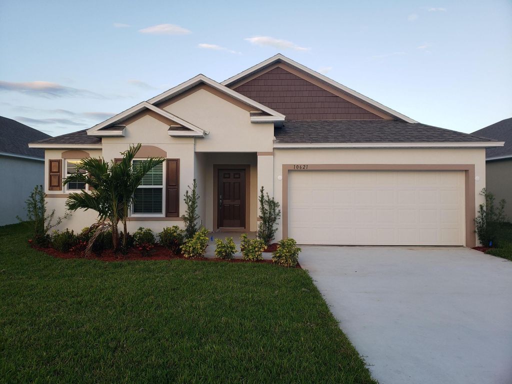 Photo of 10621 SW Vasari Way, Port Saint Lucie, FL 34987 (MLS # B26022467)