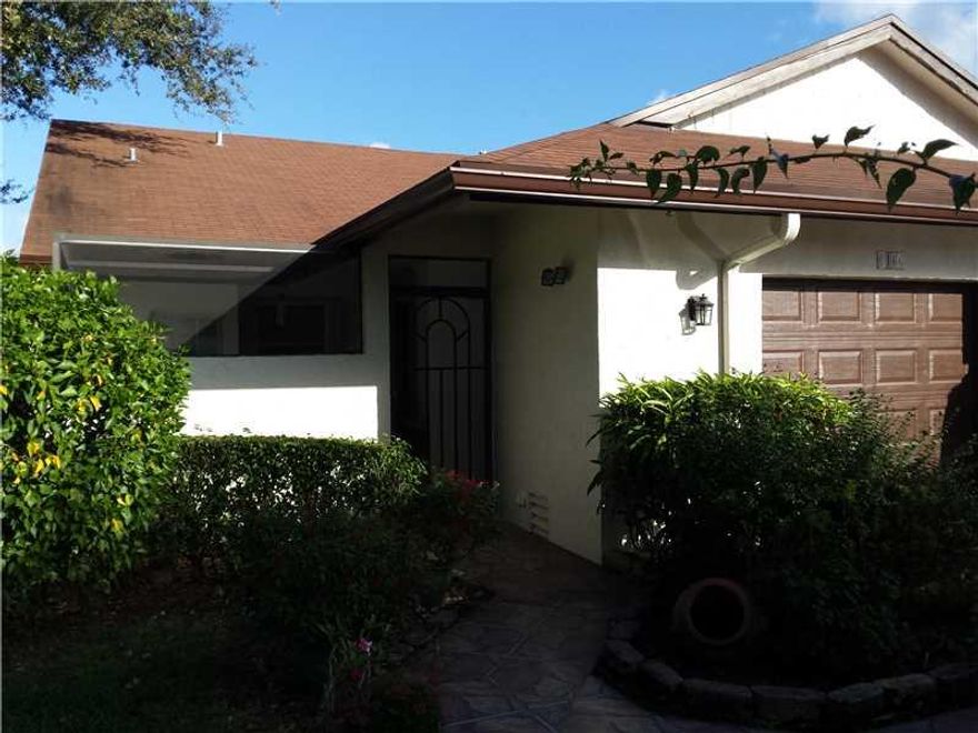 REGULAR SALE---IMMACULATE ---WELL KEPT ---2 BEDROOM 2 BATH WITH GARAGE---LARGE FRONT ENTRY SCREENED PATIO----FLORIDA ROOM----VAULTED CEILINGS---ALL APPLIANCES----UPDATED KITCHEN 2013----STORM SHUTTERS----LOCATED ON QUIET CORNER LOT WITH WATER AND GOLF COU  RSE VIEWS----ALARM SYSTEM----COMMUNITY POOL AND TENNIS---LOW HOA FEES---SHOWN BY APPT