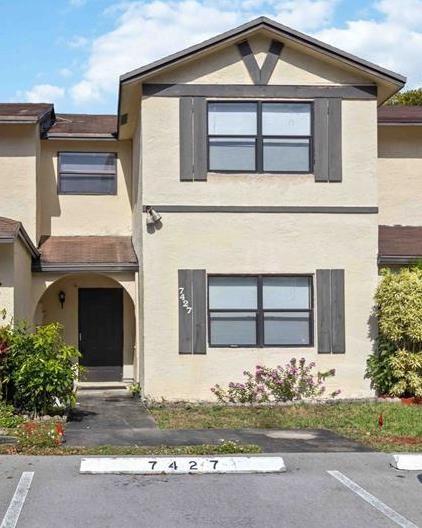 Incredibly spacious townhome completely remodeled with designer taste. Almost 1,800sf! 3 ample bedrooms and 2 bathrooms upstairs and one extra room to make 4th bedroom or den and half bath downstairs. Brand new roof August 2025, new vinyl floors all around, new bathrooms. Incredible covered and fenced-in extended patio for entertaining. 2 assigned parking spots + guest parking available in the dead-end short street. Community pool. Amazing location close to major retail, restaurants, pharmacies and access to highway. See it before it's gone!