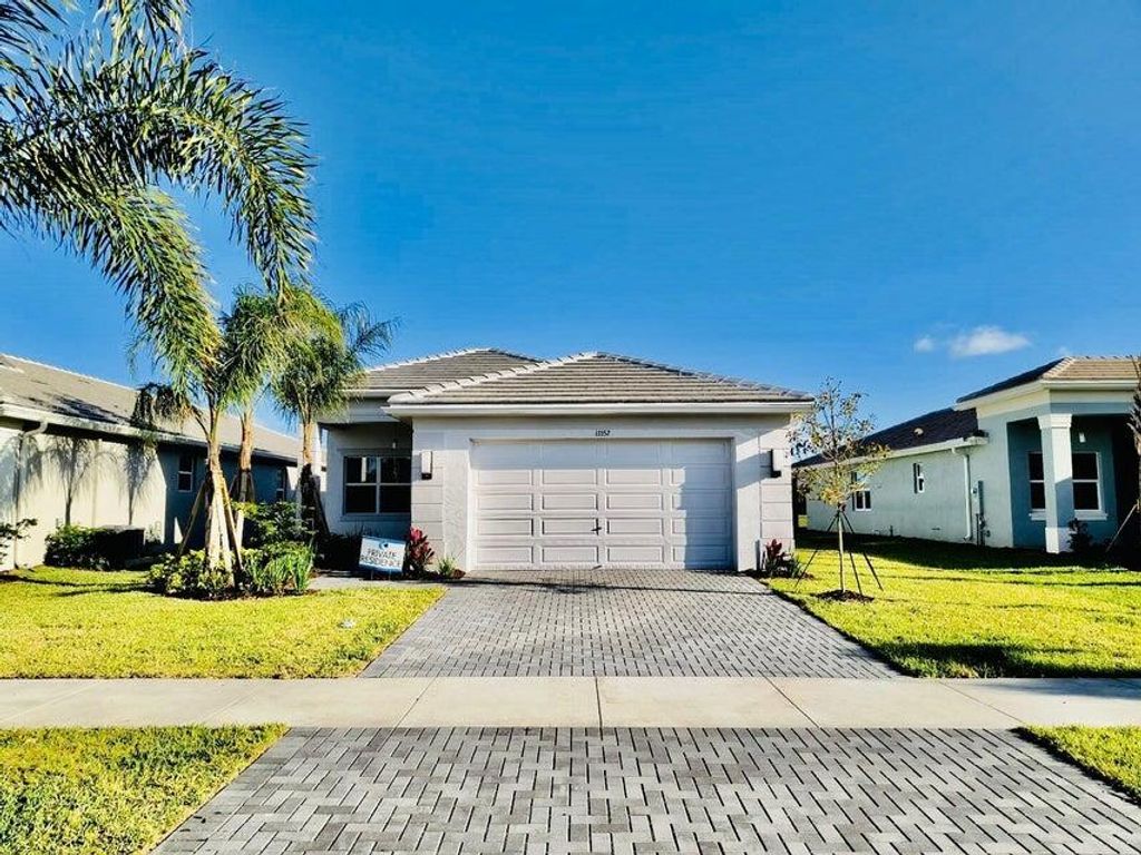 Photo of 13352 SW River Rock Road, Port Saint Lucie, FL 34987 (MLS # R11166174)