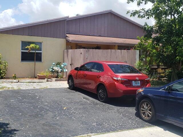 Great home for investor or first time home buyer. No HOA, with a fence up patio for privacy and fenced backyard with area for planting or to lay pavers. Minutes away from I-95. Multiple plaza for shopping and close to downtown PGA. An opportunity to update your house to your liking