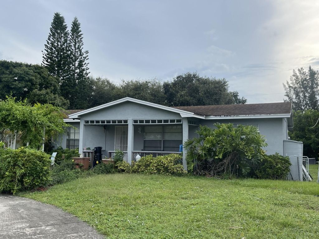Photo of 695 Dixie Lane, West Palm Beach, FL 33415 (MLS # R10916814)