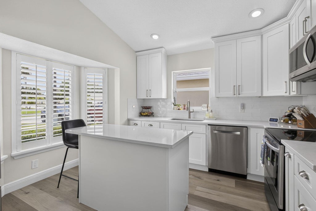 Photo of 120 Saratoga Boulevard E, Royal Palm Beach, FL 33411 (MLS # B26046042)