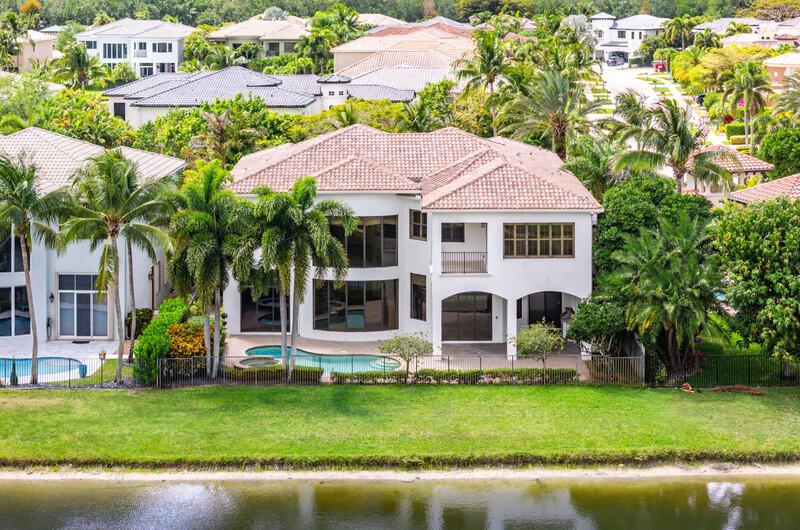 Beautiful annual rental! Experience timeless elegance in this sleek, renovated lakefront estate. Featuring six luxurious bedrooms, seven bathrooms, a stately home office, and a spacious media/theater room, the home blends grandeur with modern comfort. A tri-split garage adds convenience, while soaring ceilings and marble floors elevate the main living spaces. The formal dining room is highlighted by a sleek gas fireplace and an entertainer's wet bar with beverage fridge and sink--perfect for refined gatherings. Located within one of Boca Raton's most prestigious gated communities with amenities galore: The Oaks.