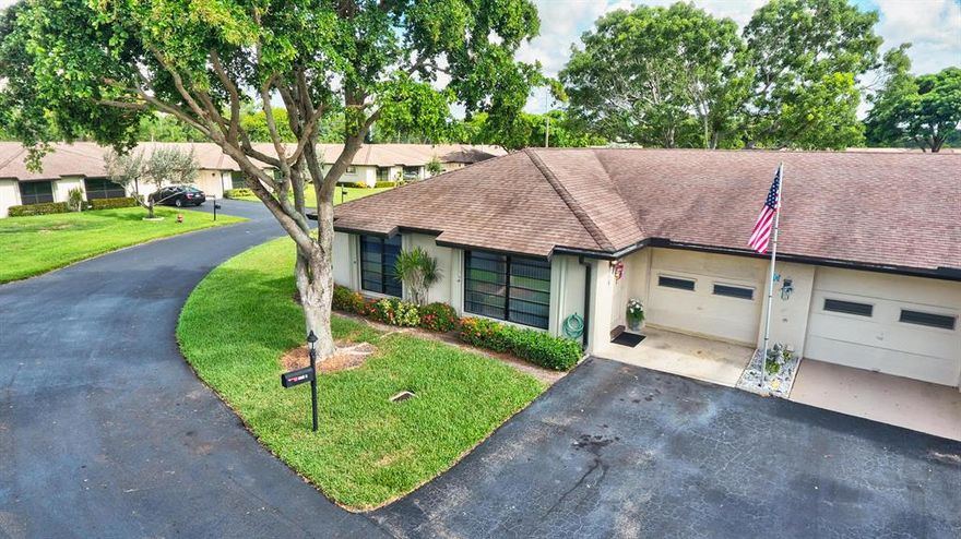 ONE OF THE LOWEST PRICED VILLA IN GREENTREE  WITH  LOCATION LOCATION 55 +  CORNER LOT VILLA WITH EXTRA LARGE GARDEN AT REAR STEPS FROM THE CLUBHOUSE  WITH POOL 
THIS ONE OF A KIND 1400 SQFT WITH 2 BEDROOMS ,2 FULL BATHS AND A ONE CAR GARAGE WITH WASHER AND DRYER FEATURES LARGE MASTER BEDROOM KITCHEN WITH BREAKFAST AREA LIVING ROOM /DINING AREA AND ENCLOSED PORCH  HAS LIGHT FROM CORNER ACCORDION SHUTTERS THROUGHOUT & NEWER AC UNIT JUST MINUTES FROM 1-95 CLOSE TO ALL SHOPPING RESTAURANTS AND THIS IS A MUST SEE !