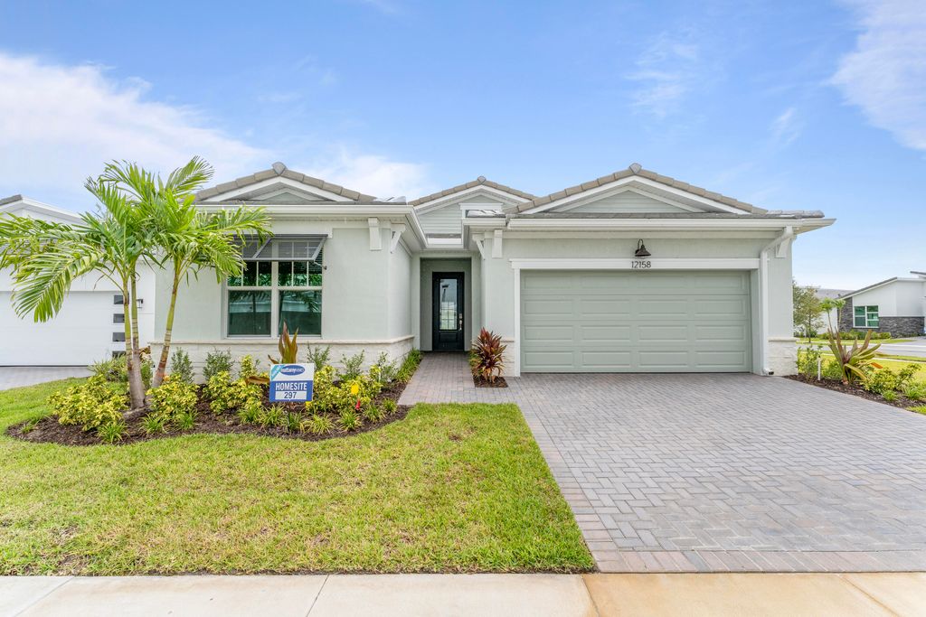 Photo of 12158 SW Viridian Boulevard, Port Saint Lucie, FL 34987 (MLS # R10889069)