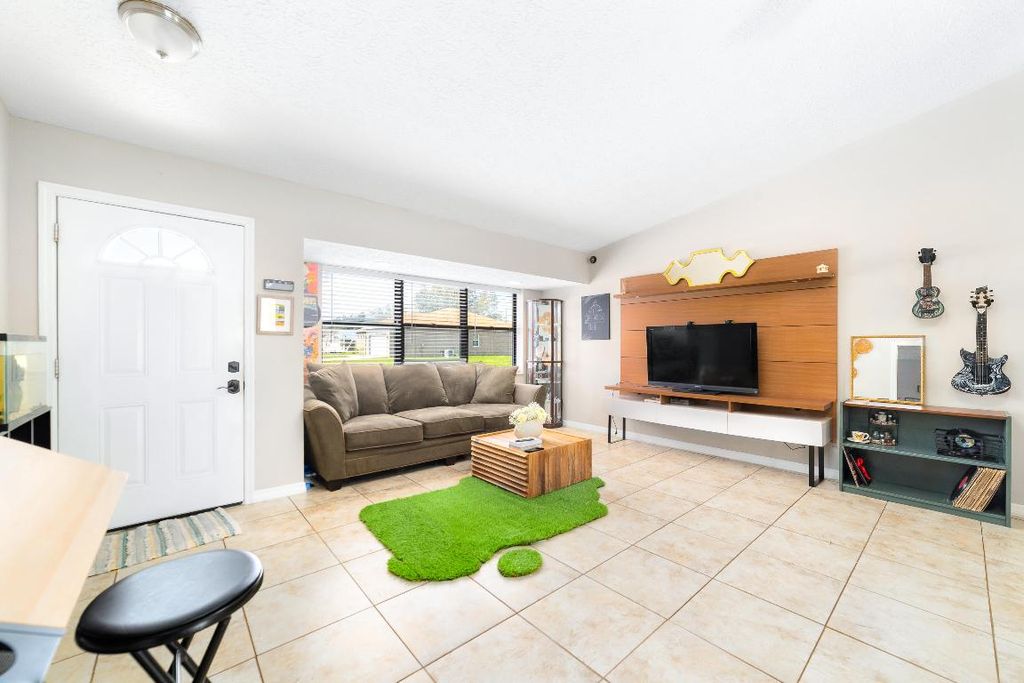 Photo of 135 SW Ridgecrest Drive, Port Saint Lucie, FL 34953 (MLS # R10961276)