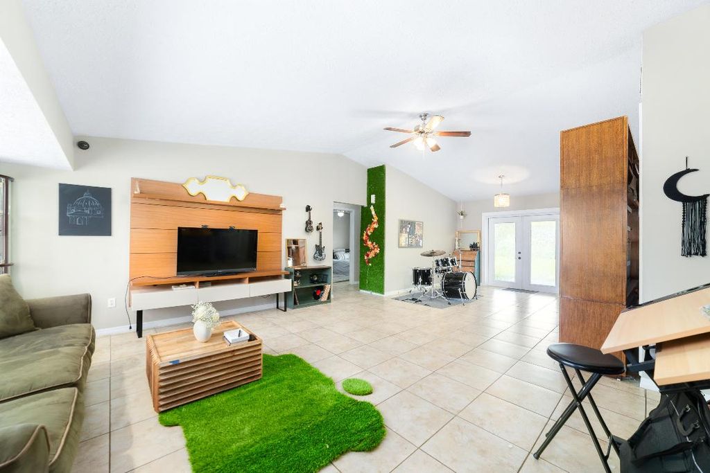 Photo of 135 SW Ridgecrest Drive, Port Saint Lucie, FL 34953 (MLS # R10961276)