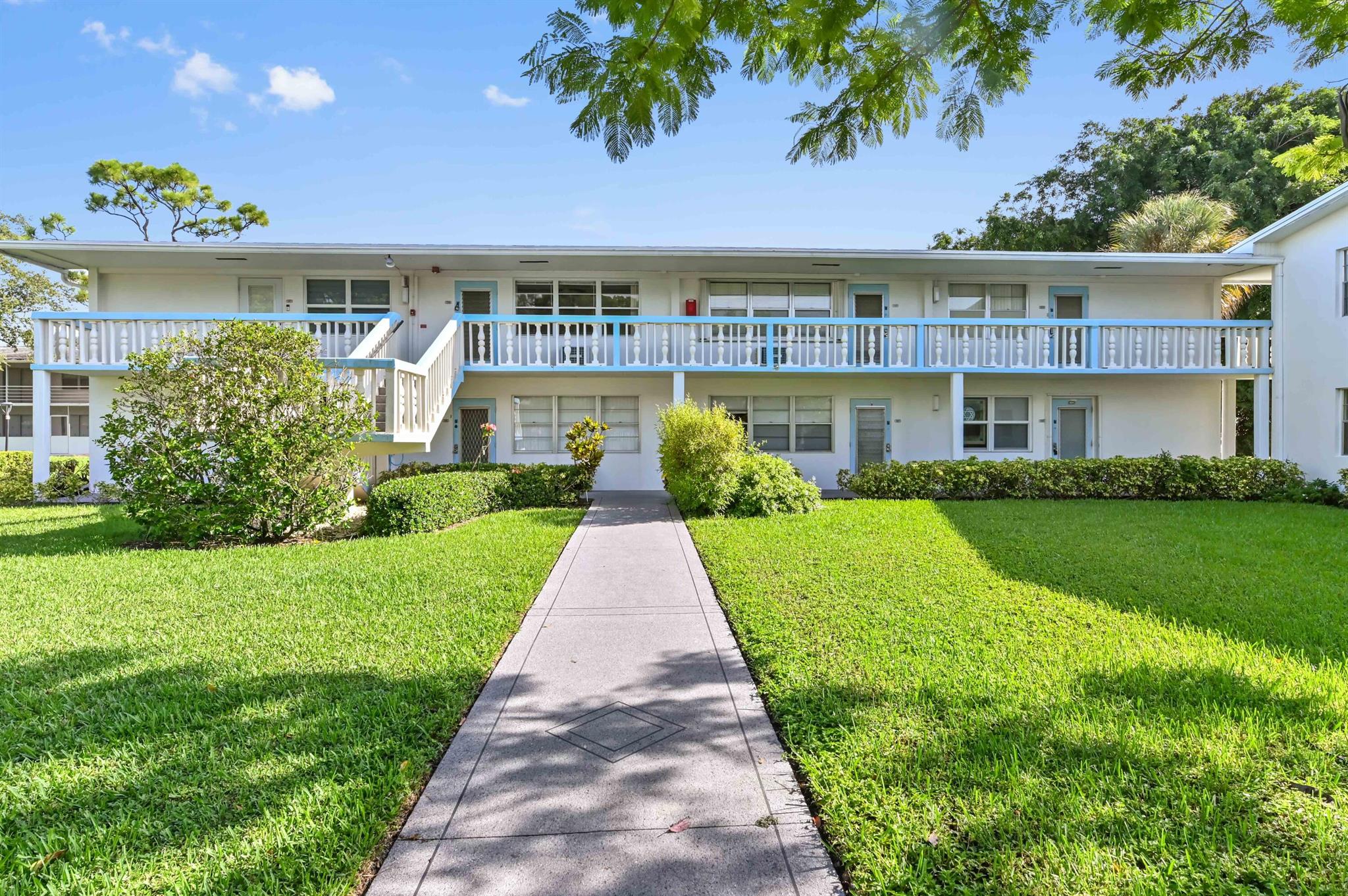 Prime Deerfield Beach Location! Discover this beautifully updated 1-bedroom, 1.5-bath condo featuring a new split A/C system in both the living room and bedroom, new electrical panel, new hot water heater, and new building roof (2024), this home is move-in ready. The kitchen shines with a new stove, white appliances, flood lighting, and no popcorn ceilings. Enjoy large ceramic tile flooring throughout and new mini-blinds. The private patio, complete with extra storage, overlooks a serene garden view. Located in the heart of Century Village East, an active adult community. Just steps from the heated outdoor pool and walking distance to a shopping plaza, this top-floor unit offers convenience and comfort.