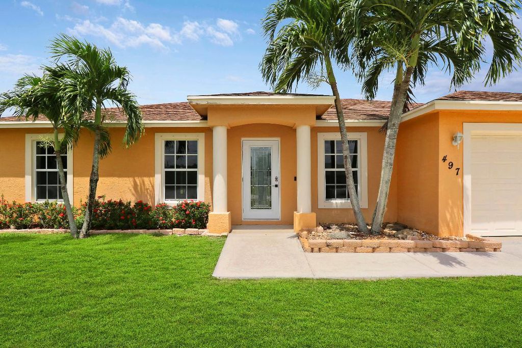 Photo of 497 SW Lacroix Avenue, Port Saint Lucie, FL 34953 (MLS # R10937029)