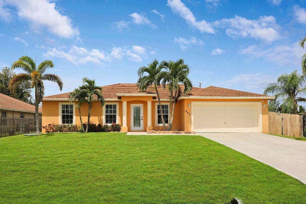 Photo of 497 SW Lacroix Avenue, Port Saint Lucie, FL 34953 (MLS # R10937029)
