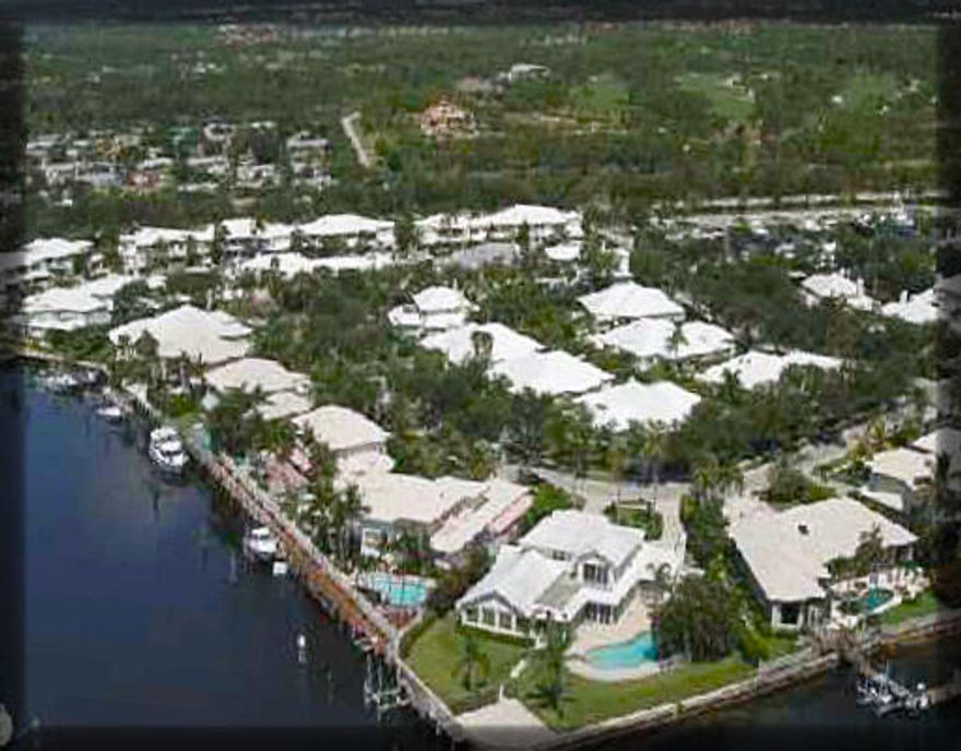 This irregularly shaped property has 260 feet of frontage on the water and 180 feet on the street and is 111 feet deep. It can be sold as one parcel, split into 2 parcels, or we can construction either 1 or 2 houses.