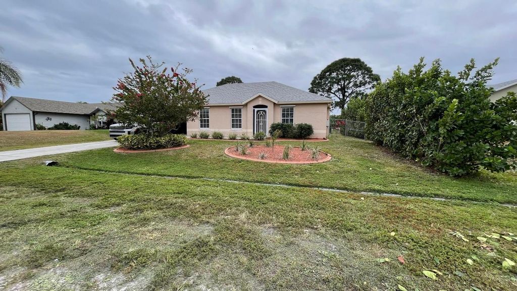 Photo of 444 SW Exmore Avenue, Port Saint Lucie, FL 34983 (MLS # R11154470)