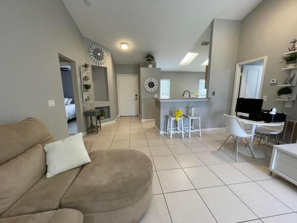 Photo of 444 SW Exmore Avenue, Port Saint Lucie, FL 34983 (MLS # R11154470)