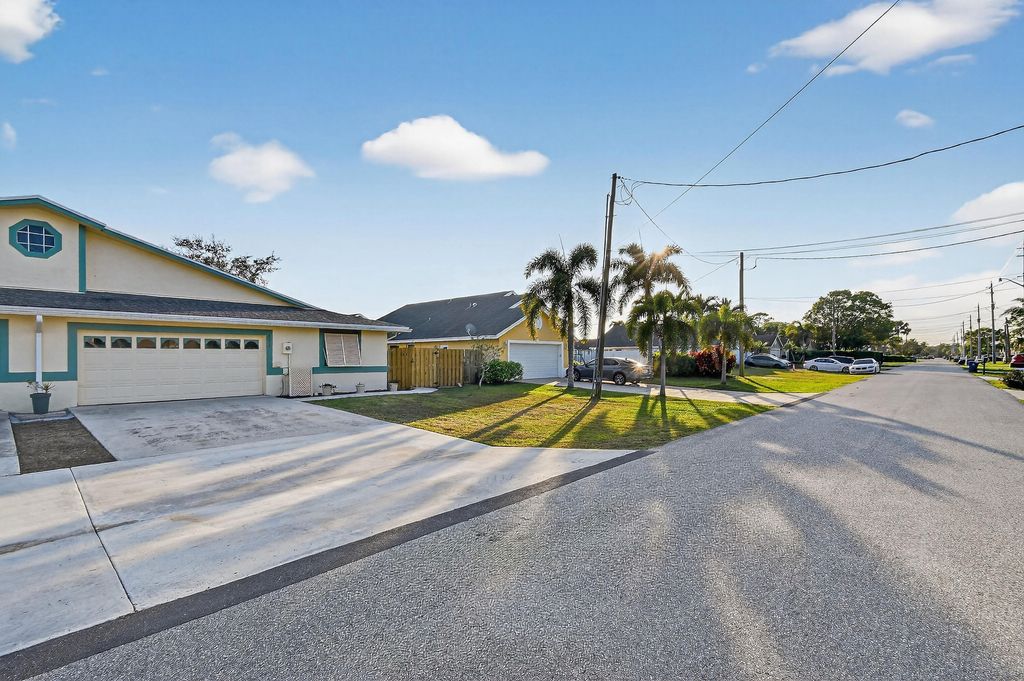 Photo of 6016 Pompano Street, Jupiter, FL 33458 (MLS # R11159013)