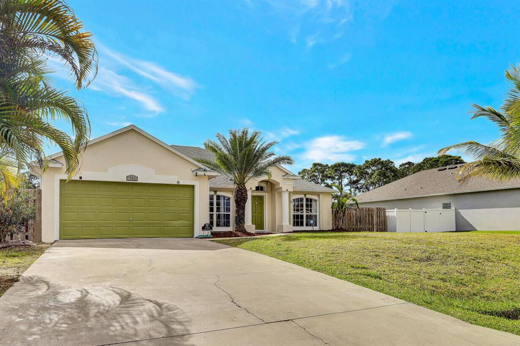 Photo of 1762 SW Apache Avenue Ave, Port St Lucie, FL 34953 (MLS # R10761110)