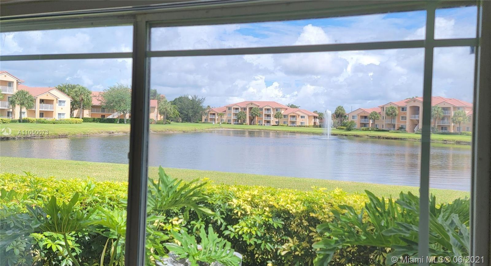 BEAUTIFUL LAKE VIEW Move in ready! This 1/1 features Living room tile, view of the lake from sliding door to the balcony, Kitchen feature granite counters and backsplash and all stainless appliances. Washer and Dryer in separate laundry room off kitchen. Bedroom carpet, Bathrooms have granite counters and master bath has a Tub. There is a separate locker storage room outside the front door. Unit wil be professionally cleaned prior to final walk through. Unit is vacant and very easy to show. First, last and security required for move in. If you decide to apply, send me proof of income, screenshot of credit score and copy of ID. Gated community with Clubhouse, pool, fitness center, picnic area and child playground. Must to see!!!!