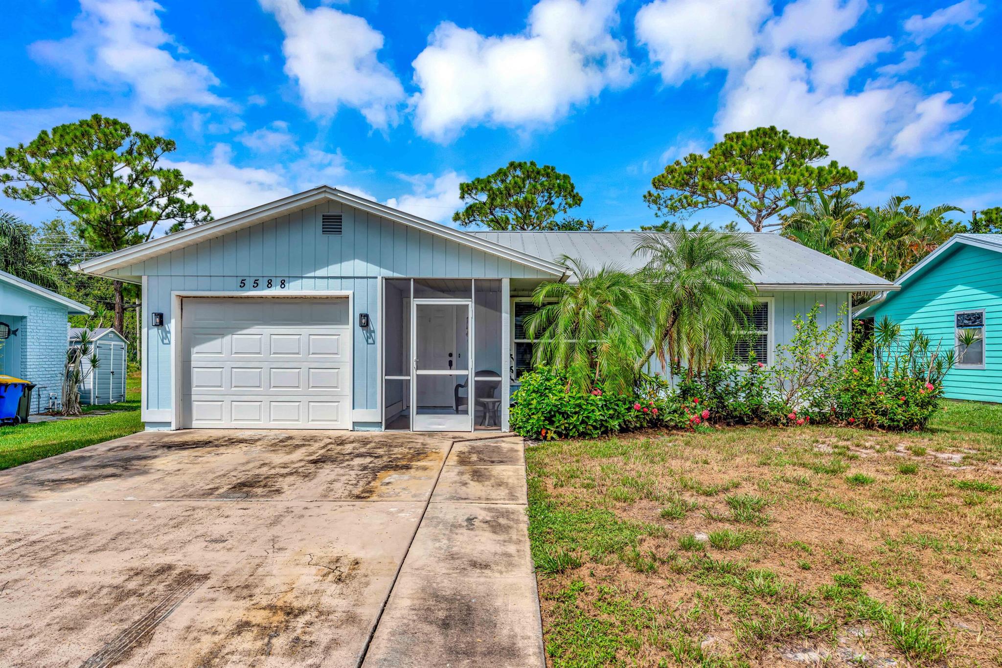 Welcome to your dream home in Stuart, Florida! This charming 2-BR, 2-BA/1 car garage residence is a turn-key estate looking to create lasting memories. The home features a thoughtfully designed layout, with a beautifully updated kitchen and bathroom space that showcase modern aesthetics and functionality. You'll appreciate the brand-new appliances that make cooking a delight, as well as new fixtures, fresh paint, new floors, new cabinets, new quartz countertops, and NO HOA! You are immediately greeted with cathedral ceilings and vaulted ceilings. The interior is enhanced by new ceiling fans and light fixtures, adding a fresh and inviting ambiance throughout. Step outside to discover a lovely fenced backyard, ideal for outdoor activities, gardening, or simply enjoying the Florida sunshine.