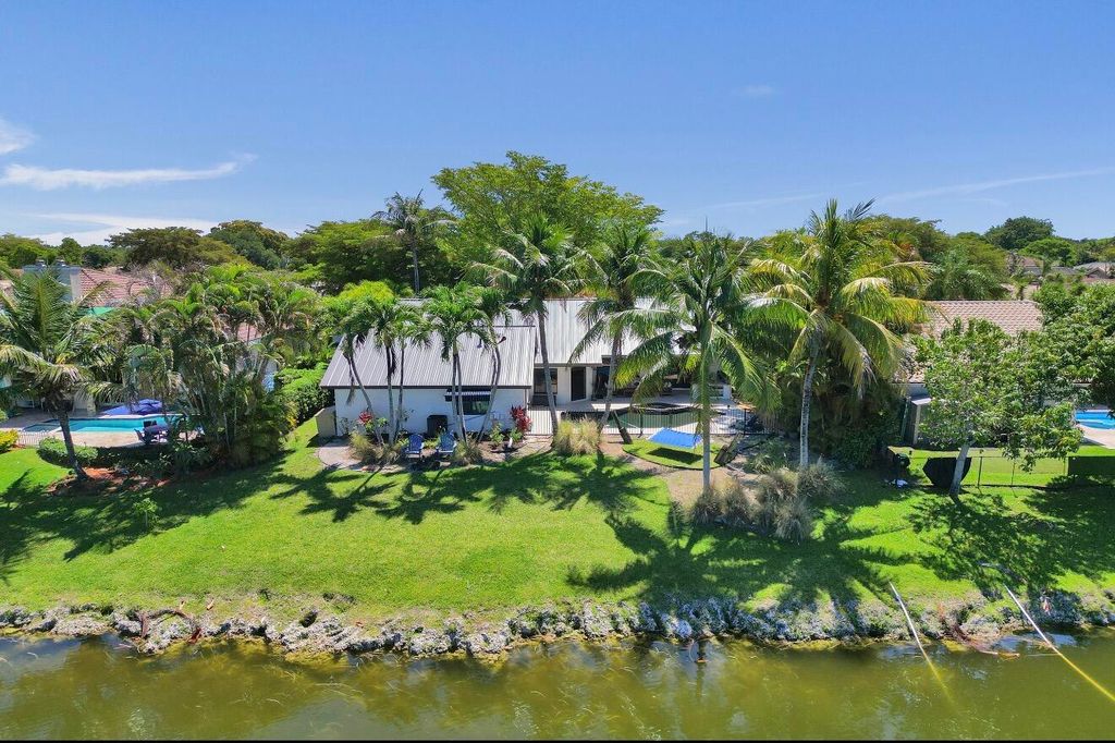 Photo of 5102 NW 59th Way, Coral Springs, FL 33067 (MLS # B26026633)