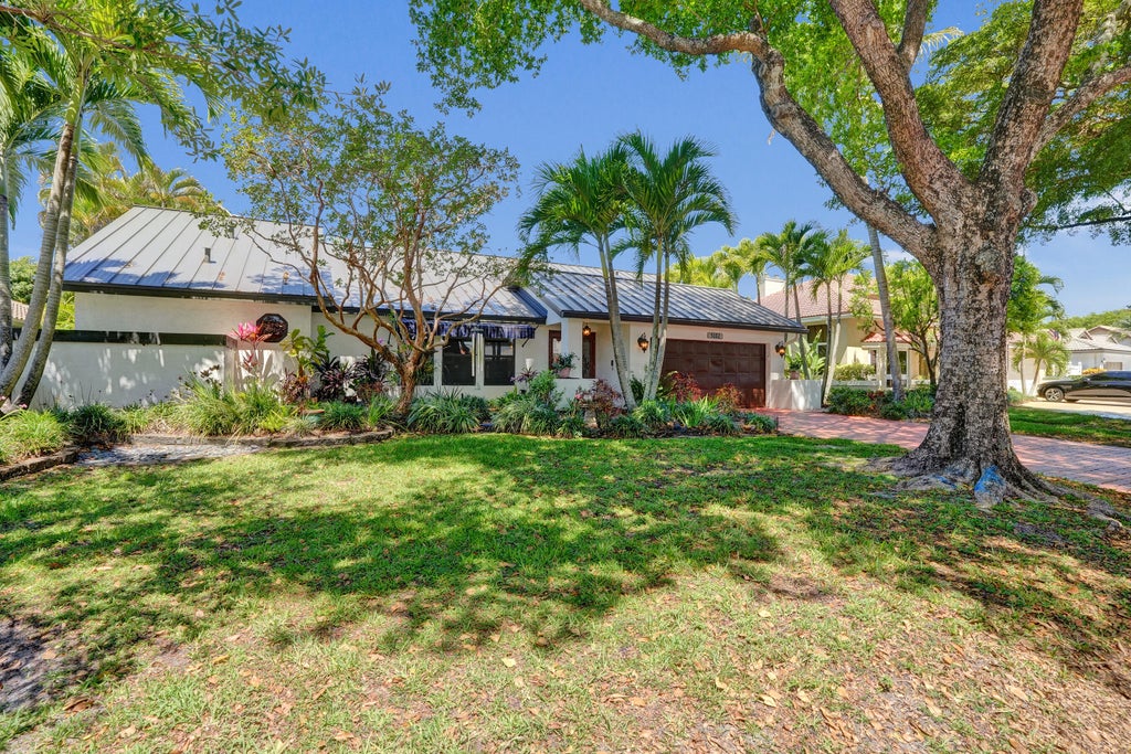 Photo of 5102 NW 59th Way, Coral Springs, FL 33067 (MLS # B26026633)