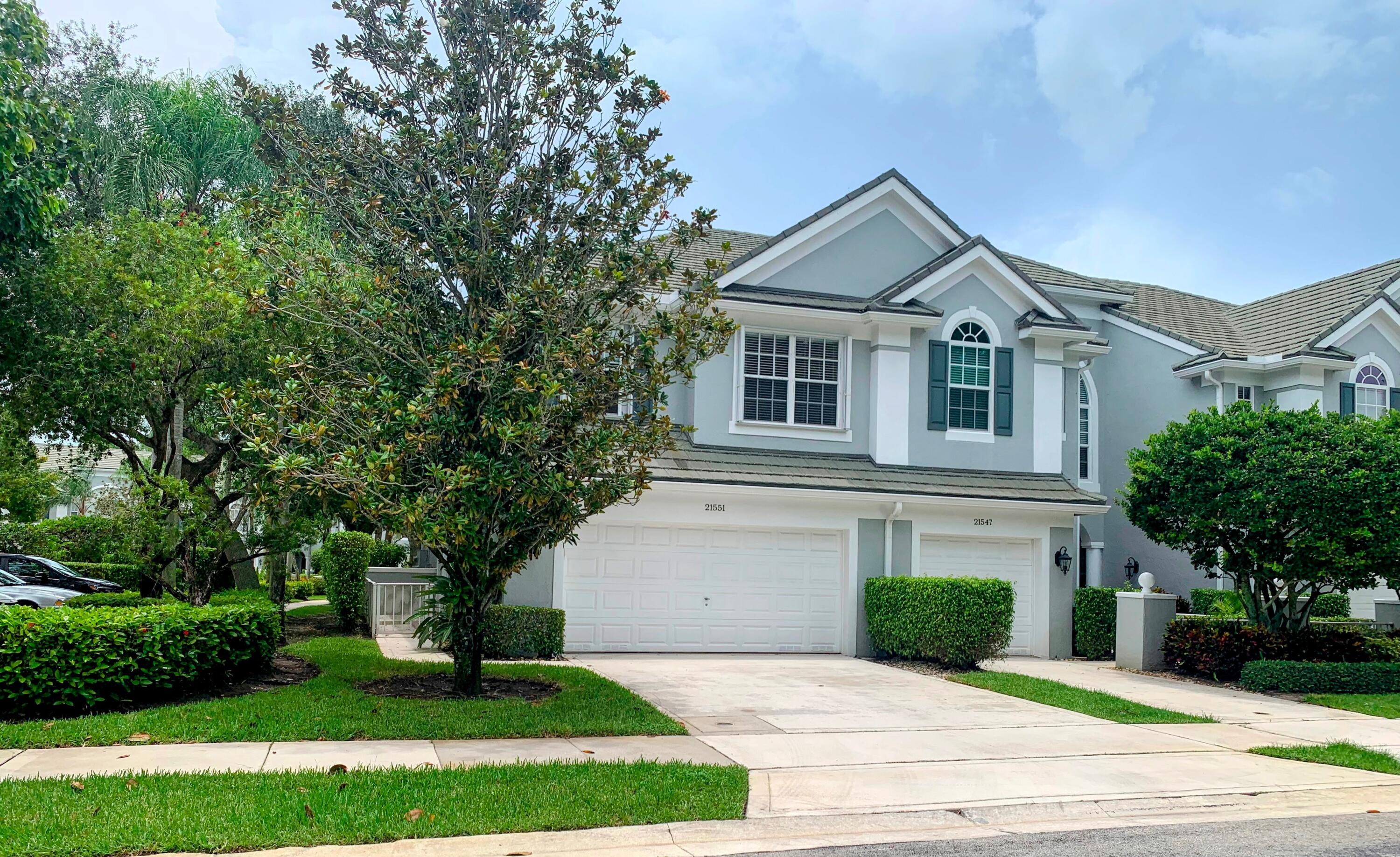 Charming, Light-Filled & Spacious Corner Townhouse in a Peaceful Gated Community. This 3-bedroom, 2.5-bathroom home is conveniently located just steps from Town Center Mall. With a 2-car garage . The home features soaring ceilings, beautiful crown molding, and a kitchen with granite counter tops and stainless steel appliances. The flooring combines tile and laminate for a modern touch. The generous master suite includes a substantial walk-in closet and a master bathroom with dual sinks, a separate shower, and a relaxing tub. Two additional bedrooms and a laundry room on the second floor complete this home. Fully hurricane-protected with accordion shutters, this townhouse is ideally situated close to I-95, the Turnpike, and is zoned for excellent A-rated schools.