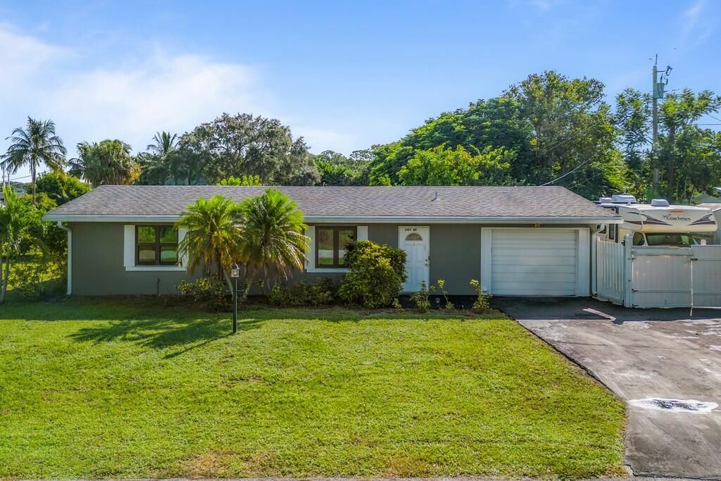 Photo of 3197 NE Lake Avenue, Jensen Beach, FL 34957 (MLS # R10926728)
