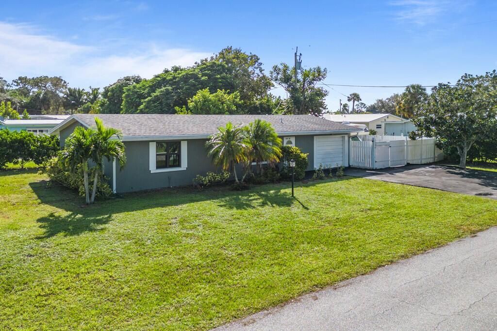 Photo of 3197 NE Lake Avenue, Jensen Beach, FL 34957 (MLS # R10926728)