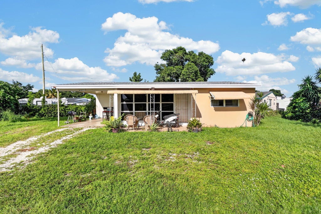Photo of 4351 Colt Lane, West Palm Beach, FL 33406 (MLS # B26081043)
