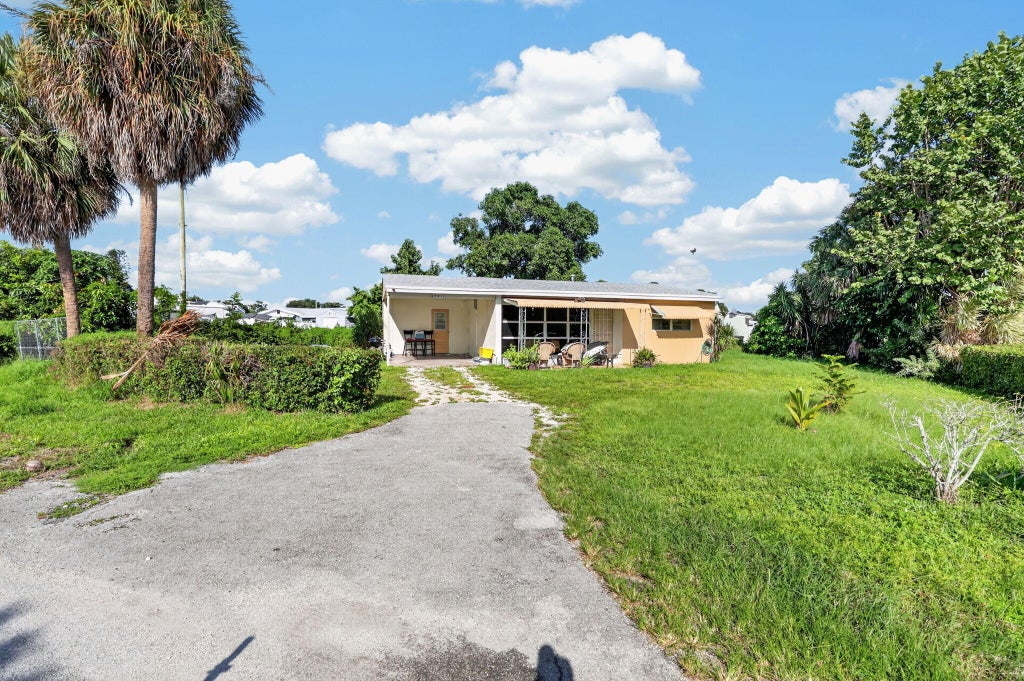 Photo of 4351 Colt Lane, West Palm Beach, FL 33406 (MLS # B26081043)
