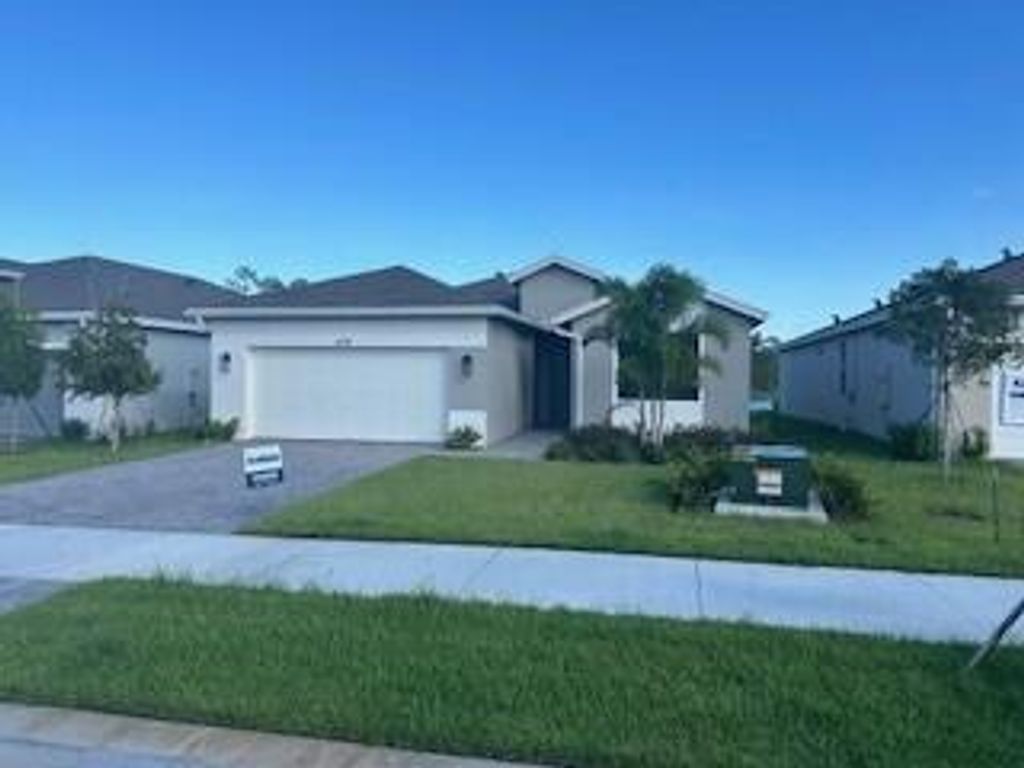 Photo of 6741 SE Park Trace Drive, Stuart, FL 34997 (MLS # R11034180)