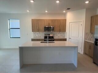 Photo of 6741 SE Park Trace Drive, Stuart, FL 34997 (MLS # R11034180)