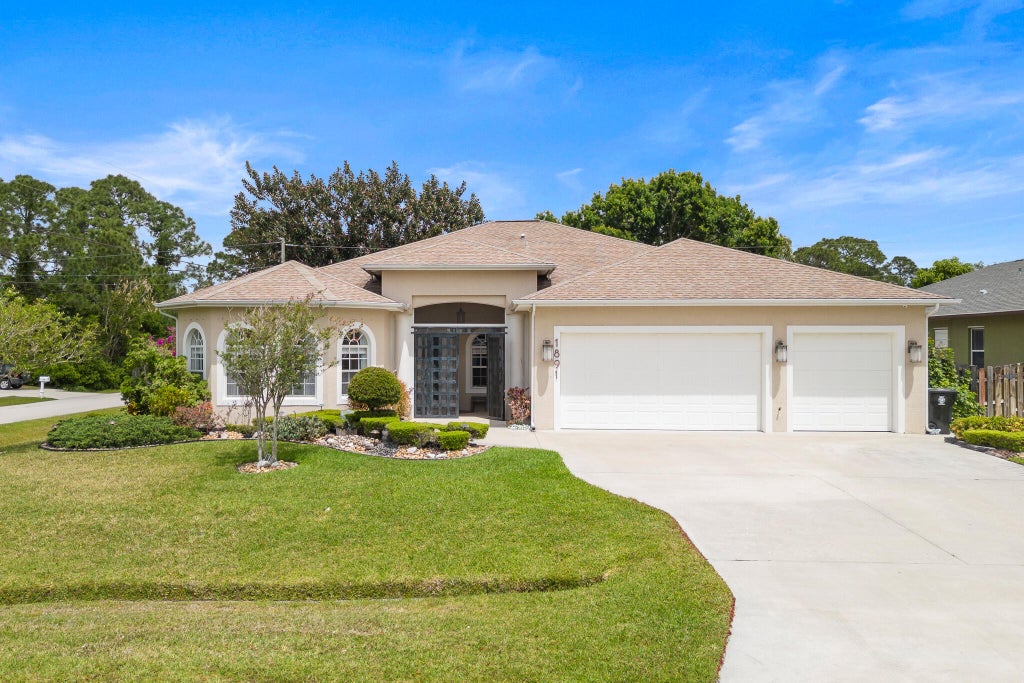 Photo of 1891 SW Altman Avenue, Port Saint Lucie, FL 34953 (MLS # R10977653)