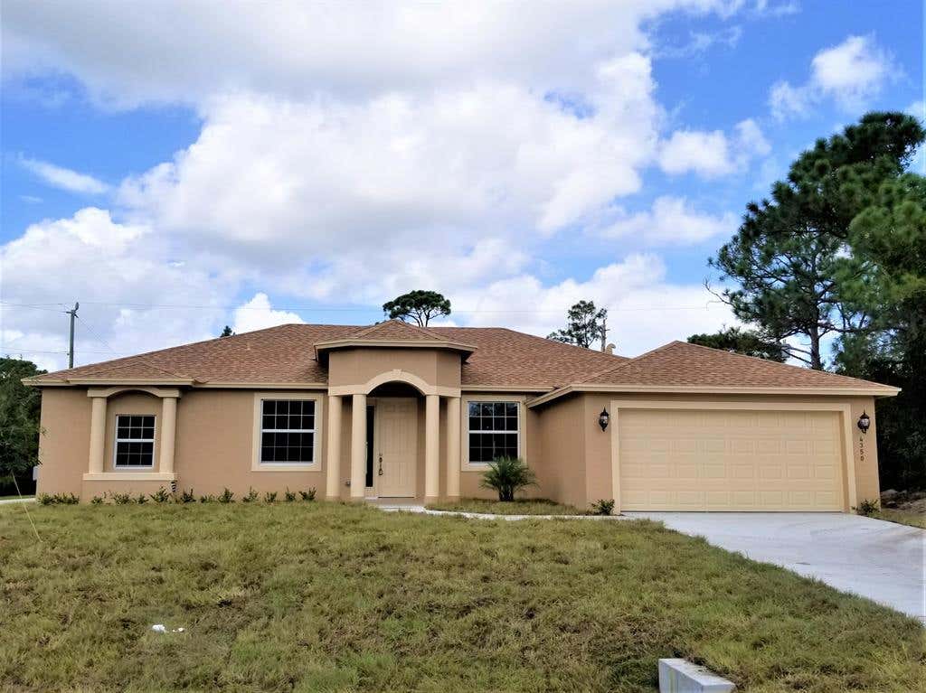 Photo of 1688 SW Alvaton Avenue, Port Saint Lucie, FL 34953 (MLS # R10719971)