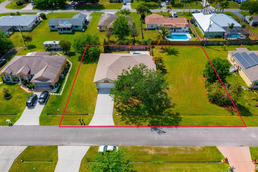 Photo of 1184 SW Dorchester Street, Port Saint Lucie, FL 34983 (MLS # R10972713)