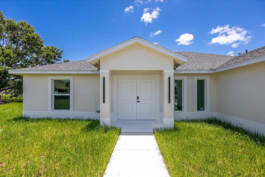 Photo of 5315 NW Nail Court, Port Saint Lucie, FL 34986 (MLS # B26038234)