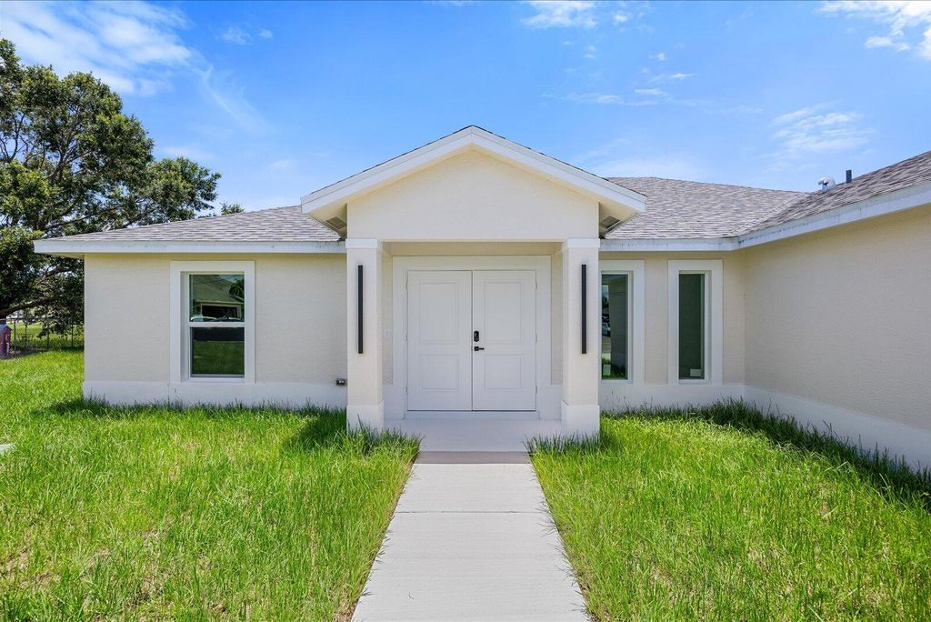 Photo of 5315 NW Nail Court, Port Saint Lucie, FL 34986 (MLS # B26038234)