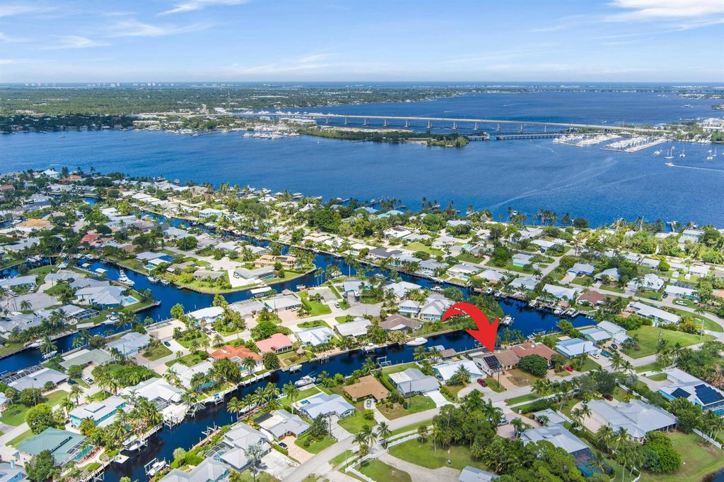 Photo of 1545 SW Dyer Point Road, Palm City, FL 34990 (MLS # R11116141)