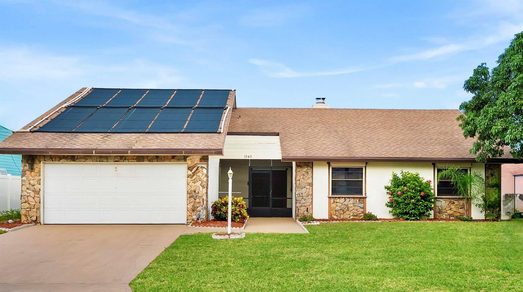 Photo of 1545 SW Dyer Point Road, Palm City, FL 34990 (MLS # R11116141)