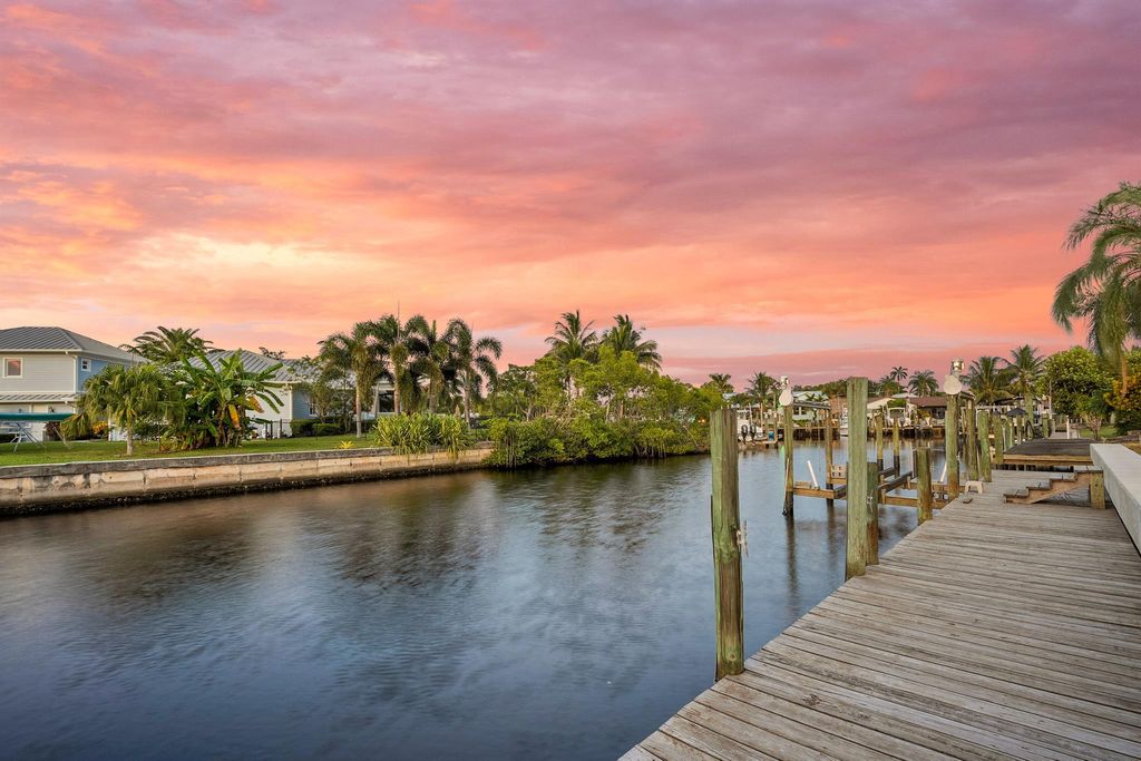 Photo of 1545 SW Dyer Point Road, Palm City, FL 34990 (MLS # R11116141)