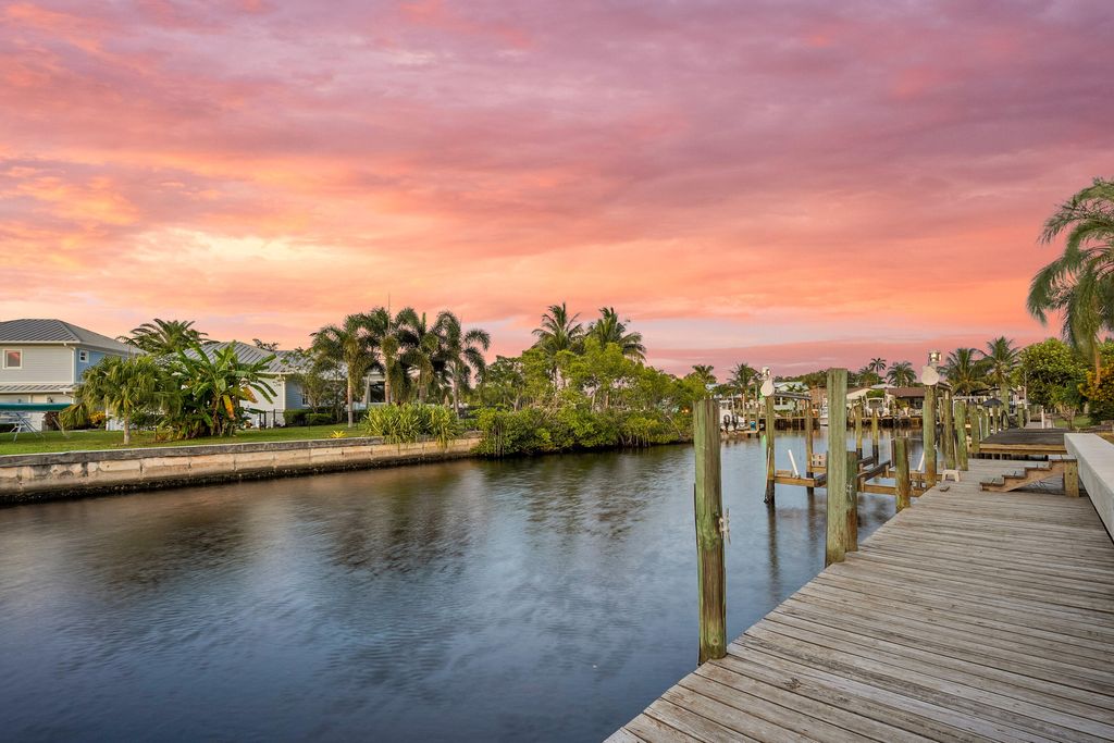 Photo of 1545 SW Dyer Point Road, Palm City, FL 34990 (MLS # R11116141)