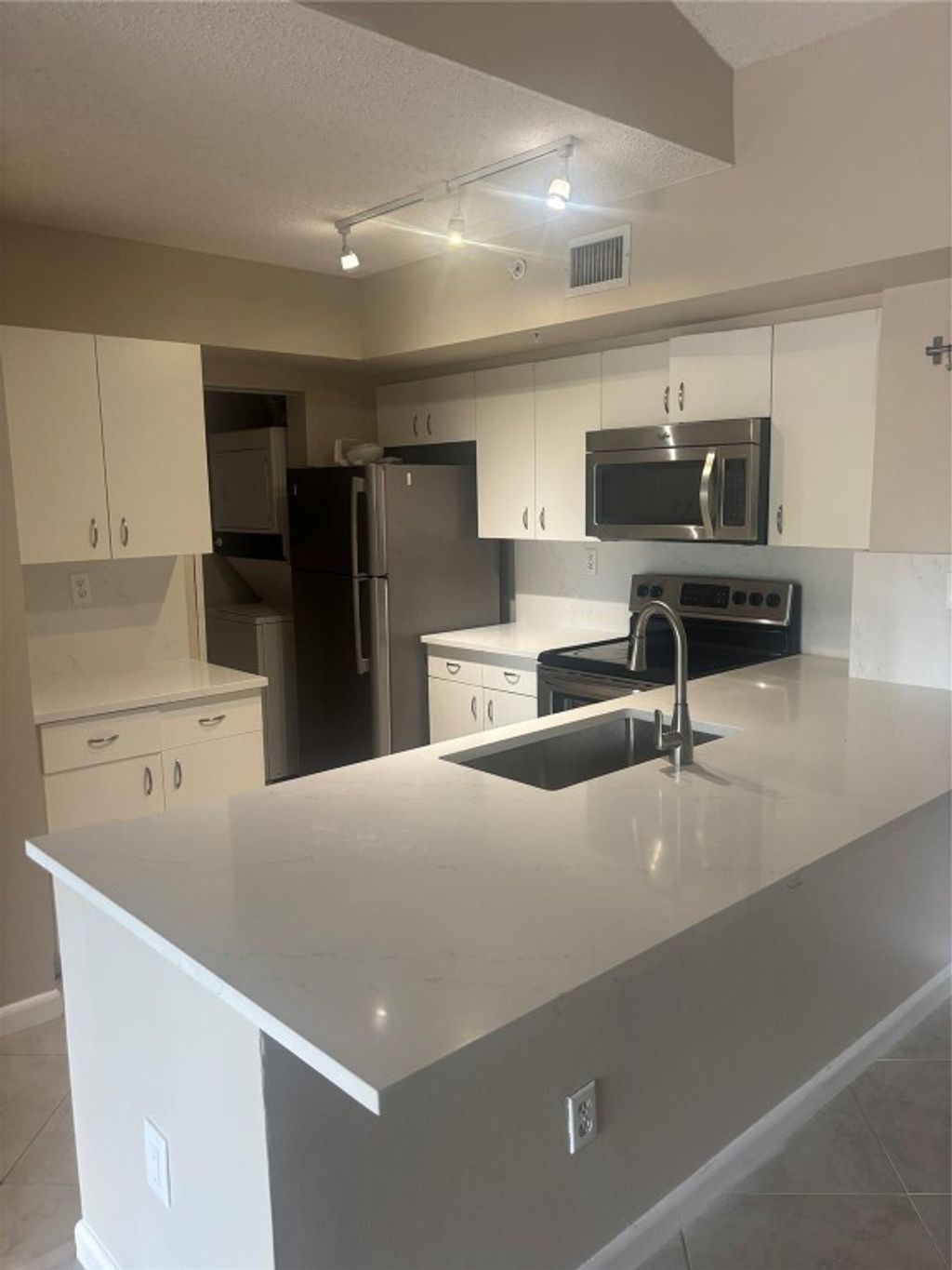 Photo of 2640 S University Drive #305, Davie, FL 33328 (MLS # F10513151)