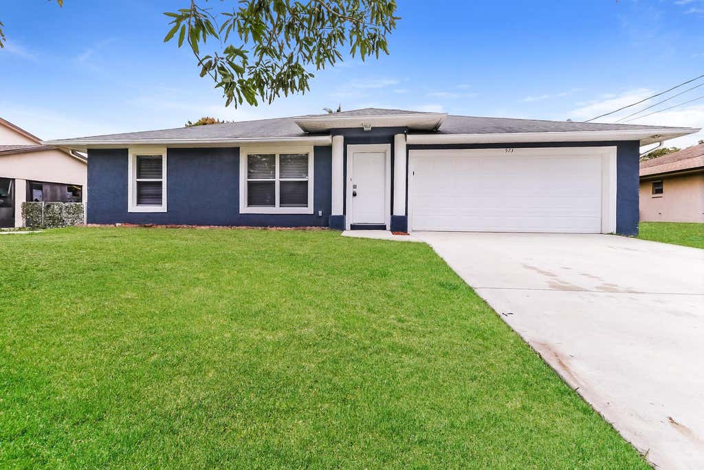 Photo of 573 SE Sweet Avenue, Port Saint Lucie, FL 34983 (MLS # R11055268)