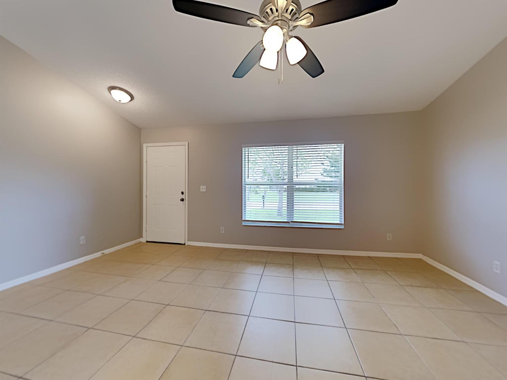 Photo of 573 SE Sweet Avenue, Port Saint Lucie, FL 34983 (MLS # R11055268)